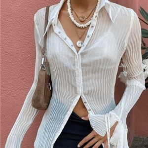 Pleated semi sheer button front top